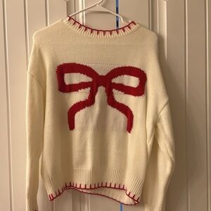 Women's Cream Sweater with Red Bow Design
